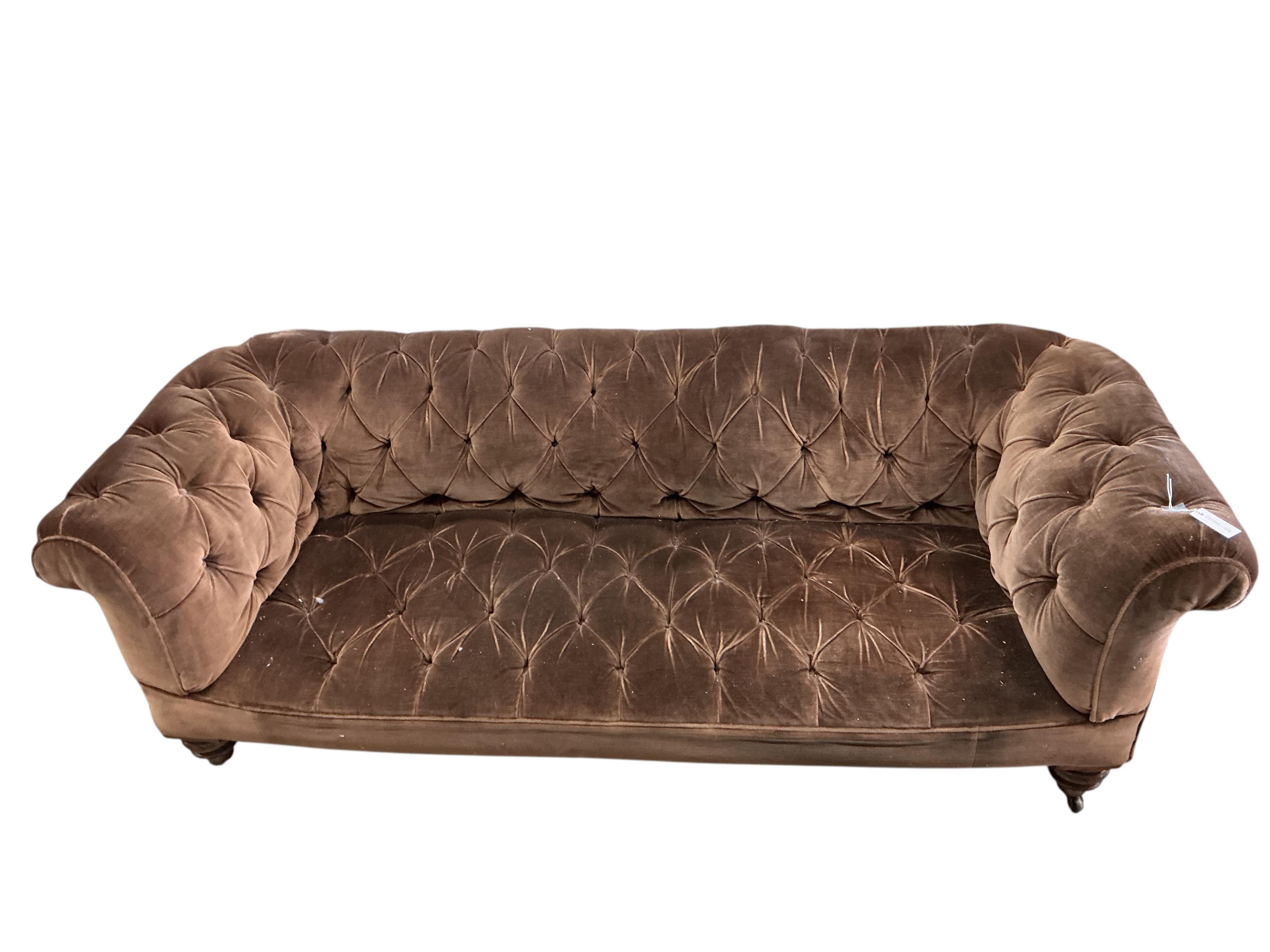 A Victorian upholstered Chesterfield settee, width 206cm, depth 82cm, height 66cm
